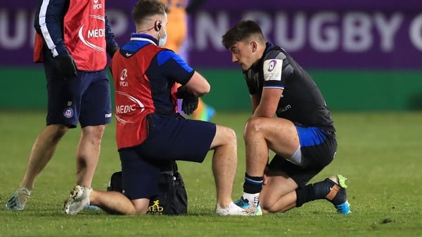 A player undergoes a head-injury assessment