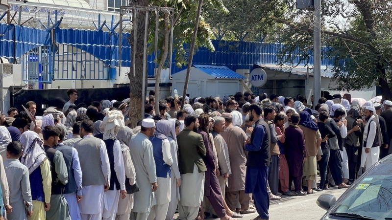Queues for a bank in Kabul earlier this month