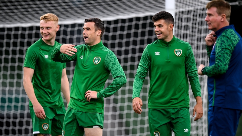 Latest call-up Liam Scales, captain Seamus Coleman and John Egan share a joke as Stephen Kenny looks on during a training session