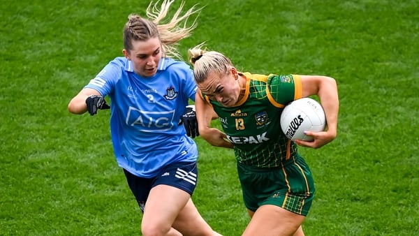 Vikki Wall drives past Martha Byrne in Sunday's decider