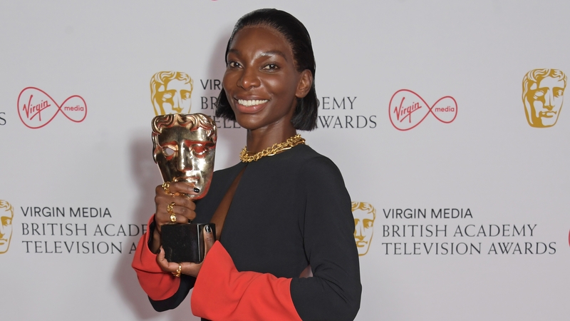 Michaela Coel pictured with the best actress award for I May Destroy You at the 2021 BAFTAs