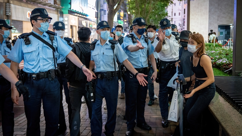 Police officers seen asking people to leave Victoria park during this year's Tiananmen anniversary
