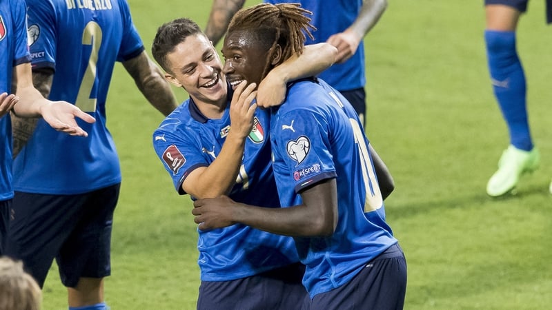 Goalscorers Giacomo Raspadori and Moise Kean celebrate during Italy's 5-0 win in Reggio Emilia