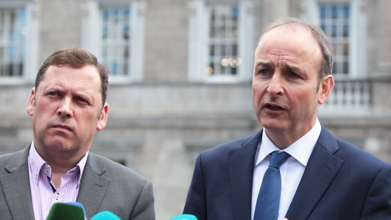 Barry Cowen (l) was sacked from his role as Minister for Agriculture by Taoiseach Micheál Martin (r) just over a year ago (via Rollingnews.ie)