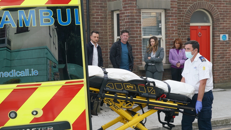 Carrigstown is in shock as Will's body is removed from the house