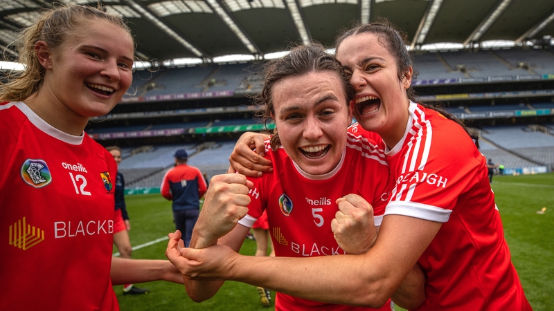 Ciara O Sullivan (L), Hannah Looney (C) and Fiona Keating celebrate after beating Kilkenny in the All-Ireland semi-final