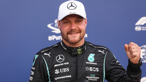 The Finn is pole for Saturday's sprint race but set to start down the grid for Sunday's grand prix