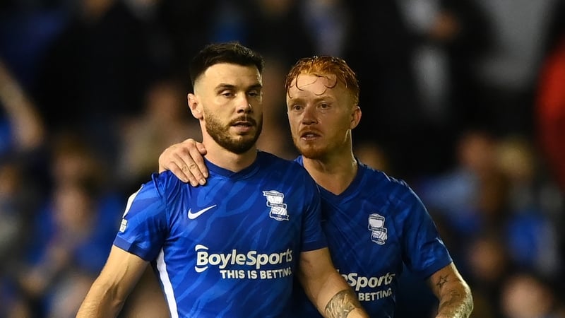 Scott Hogan (L) celebrates with Ryan Woods after opening the scoring