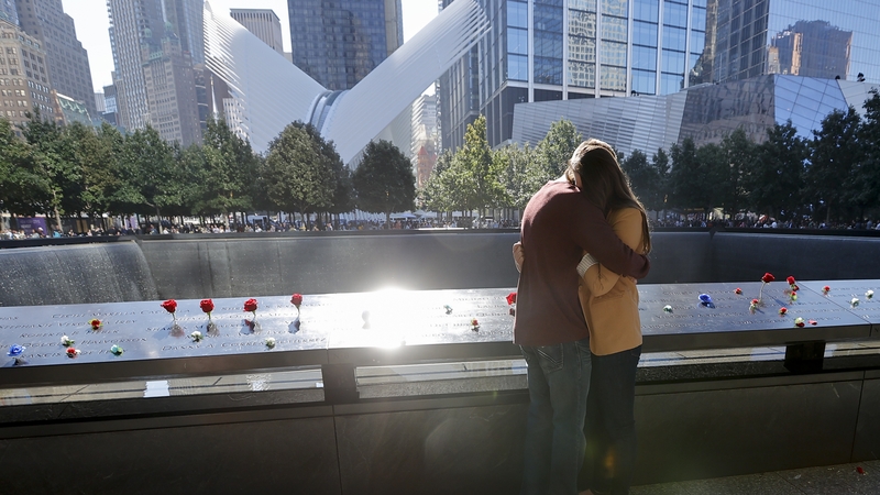 People mourn at the 9/11 Memorial on the 20th anniversary today