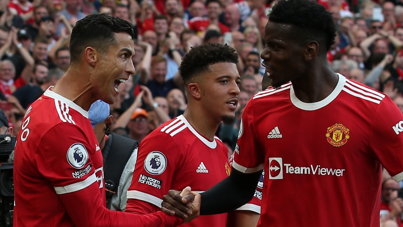Cristiano Ronaldo (left) celebrates with Paul Pogba (right)