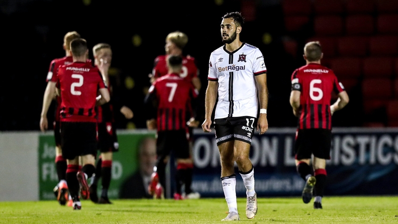 Longford Town celebrate their goal as Sami Ben Amar of Dundalk reacts to his side's concession