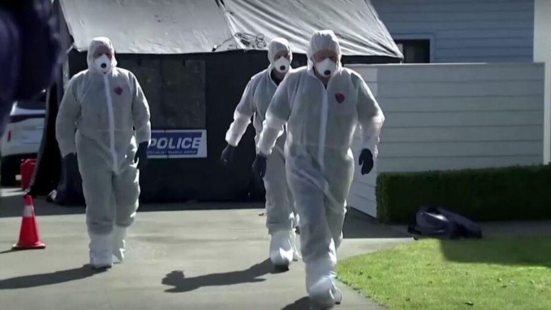 Forensic investigators at the scene of the family home in Timaru, New Zealand