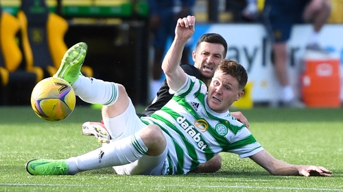 James McCarthy slides in on Livingston's Jason Holt