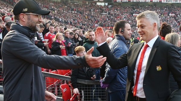Jurgen Klopp (L) with Ole Gunnar Solskjaer