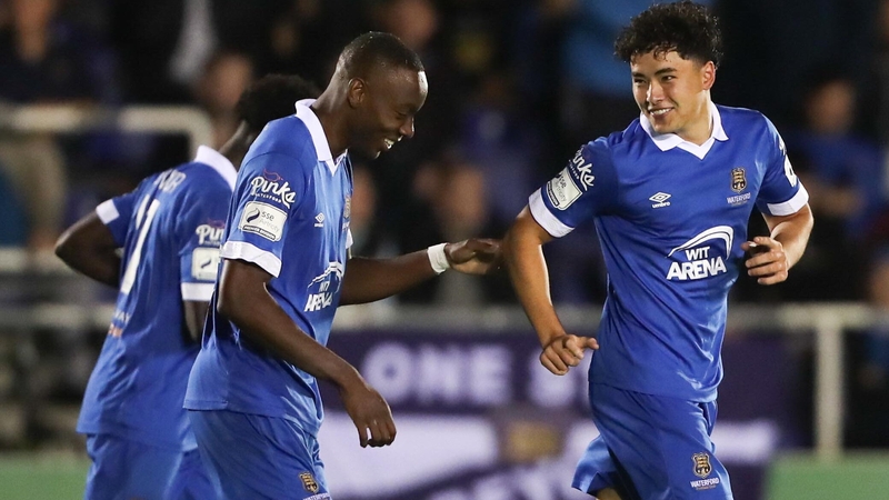 Phoenix Patterson, right, celebrates what proved to be the only goal of the game with his Waterford team-mates