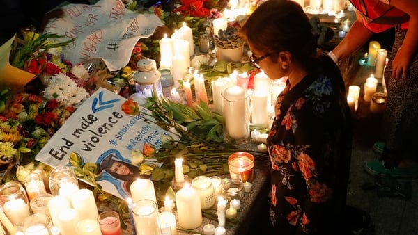 Flowers and candles were laid during a vigil in memory of Sabina Nessa