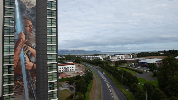 The mural is 41 metres tall and sits on the side of the Crowne Plaza Hotel