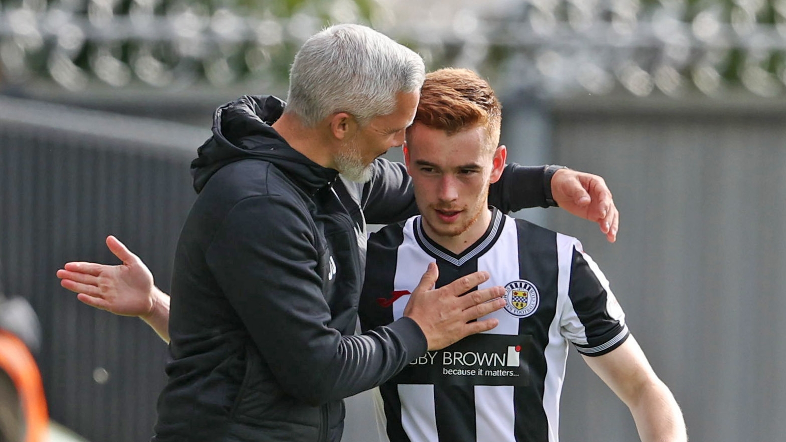Goodwin congratulates Connor Ronan after his two-goal display against Aberdeen in September