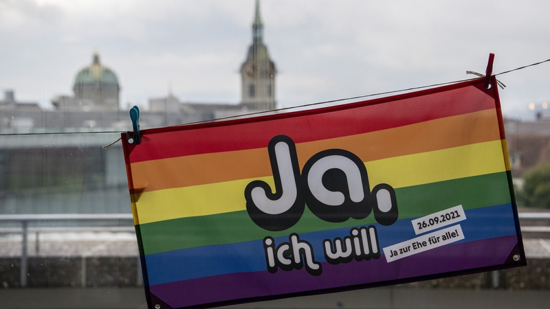 A rainbow flag reading 'Yes, I will' pictured in Bern, Switzerland, today