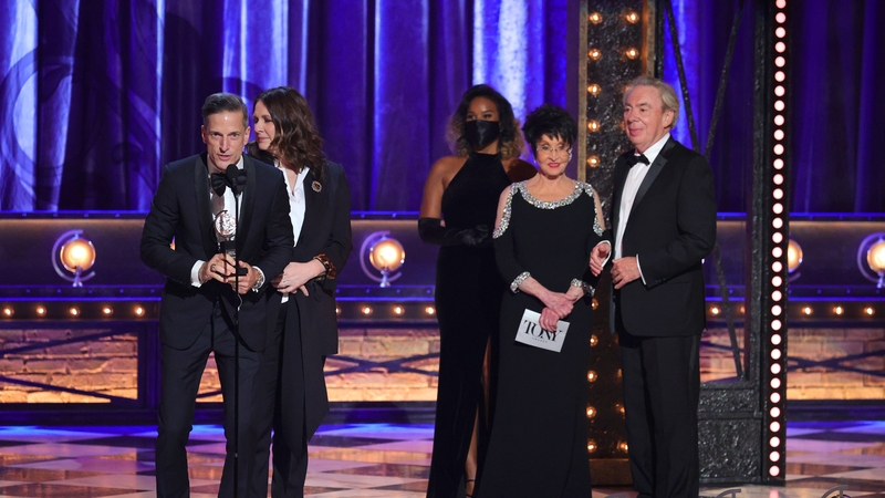 Bill Damaschke and Carmen Pavlovic accept the award for Best Musical for Moulin Rouge! The Musical from Chita Rivera and Sir Andrew Lloyd Webber onstage during the 74th Annual Tony Awards at Winter Garden Theatre in New York
