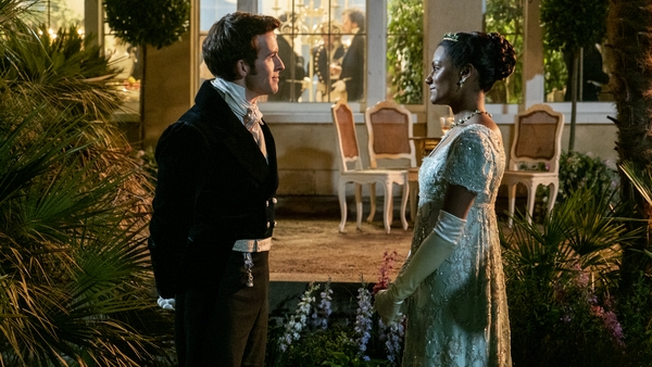 Viscount Anthony Bridgerton (Jonathan Bailey) in conversation with Kate Sharma (Simone Ashley)