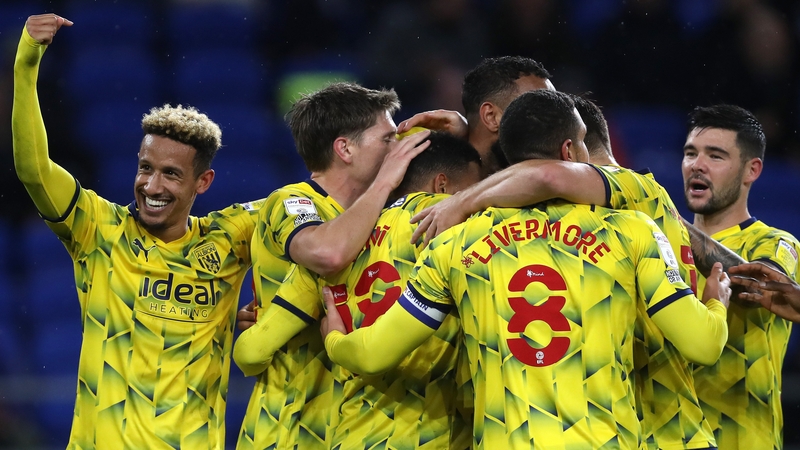 Callum Robinson (left) celebrates with his West Brom team-mates