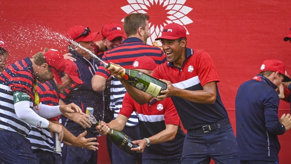 Tony Finau dispensing the champagne in the USA team's post-Ryder Cup celebrations