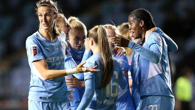 Khadija Shaw of Manchester City celebrates with Jill Scott and team mates