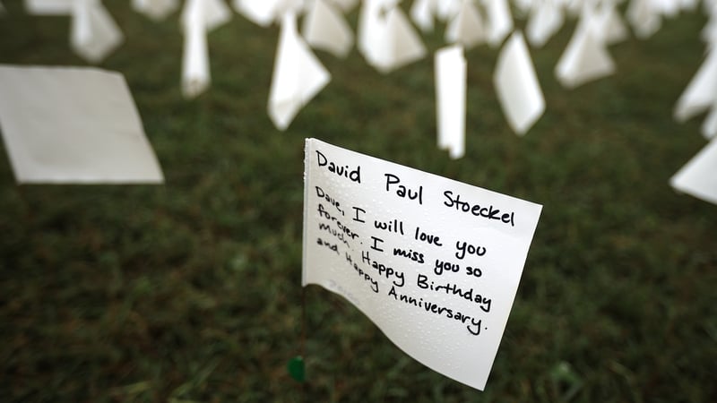 In Washington, DC hundreds of thousands of white flags flutter on the National Mall, as reminders of those who have died with Covid-19