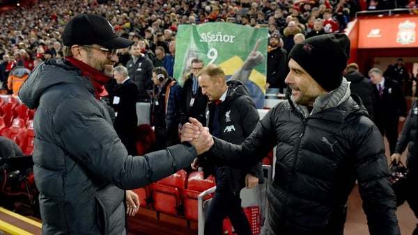 Liverpool boss Jugen Klopp (L) and Manchester City manager Pep Guardiola have both spoken for the need for the five subs rule