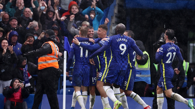 Timo Werner is congratulated by his team-mates after putting the hosts 2-1 up