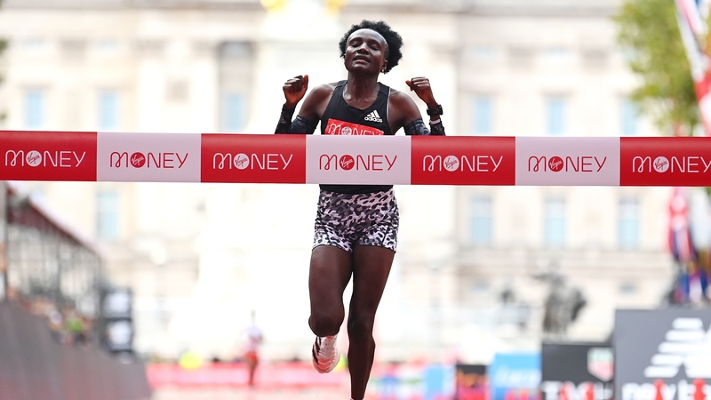 Joyciline Jepkosgei crosses the winning line