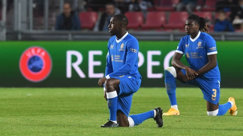 Kamara taking the knee before the game