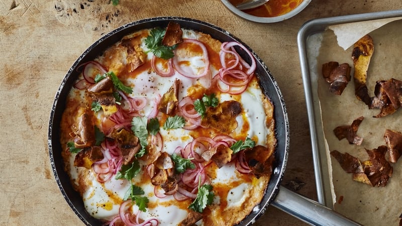 This creamy, cheesy version of the baked egg classic swaps in sweet potatoes.