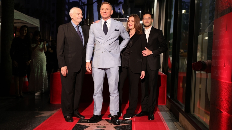Michael G. Wilson, Daniel Craig, Barbara Broccoli and Rami Malek