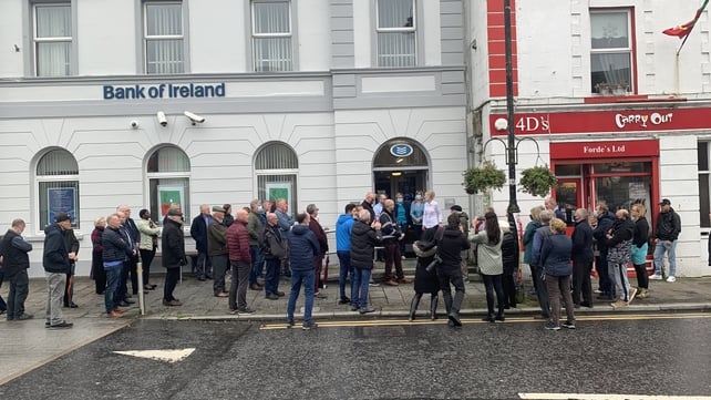 8 October: Protesters gather outside the Bank of Ireland branch in Ballyhaunis, Co Mayo, one of 88 branches the bank closed as part of restructuring announced earlier in the year (Photo: Pat McGrath)