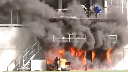The TV gantry at the side of the stadium was engulfed in flames