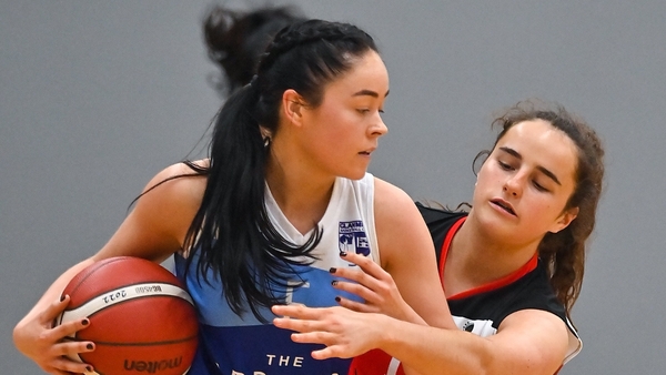 Lesley Ann Wilkinson of The Address UCC Glanmire (l) in action against Rachel Ryan of Team Garvey's St Mary's