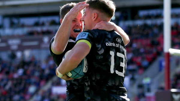 Liam Coombes celebrates his first try