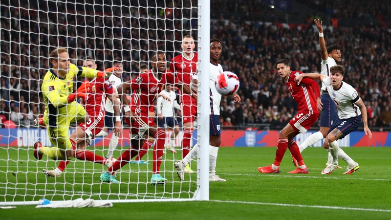 John Stones glances an effort just wide