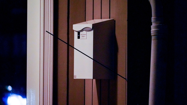 An arrow is seen embedded in a wall following the attack