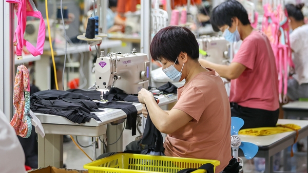 China's October industrial output grew 5.3% from a year earlier, slowing from September's 5.4% pace