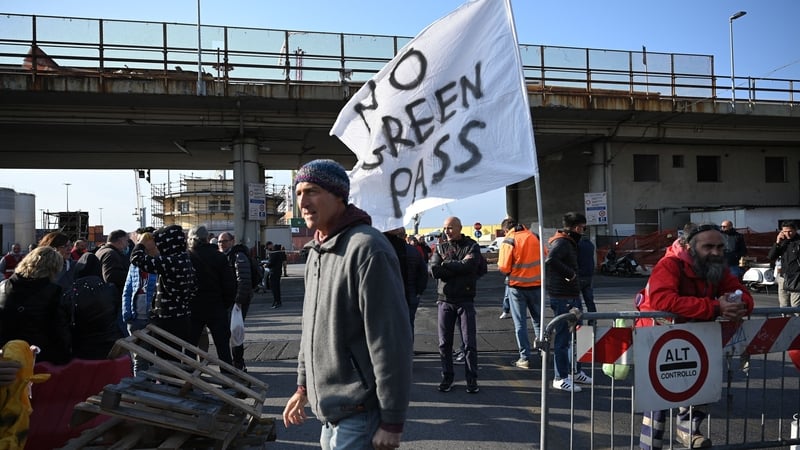 Workers protest at the entrance of the port of Genoa, Liguria