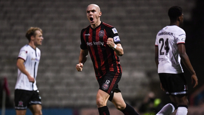 Georgie Kelly celebrates converting his spot-kick at the death