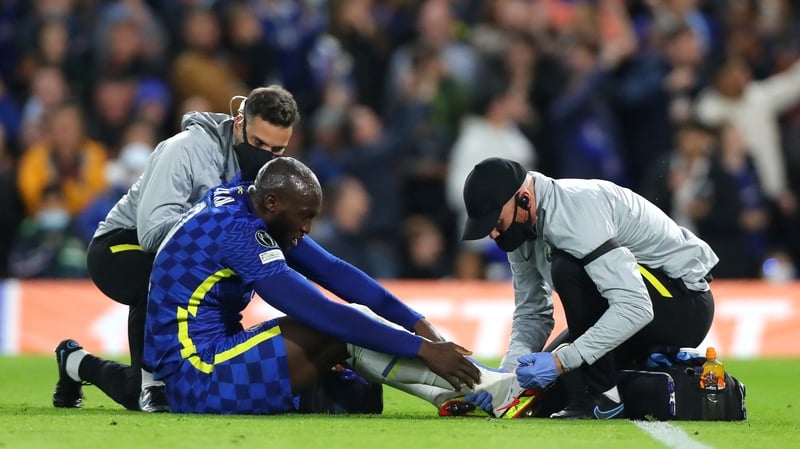 Romelu Lukaku receives attention on the ankle injury that forced him off