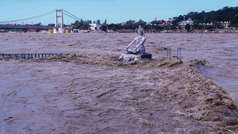 A statue of Hindu god Lord Shiva amid the risen water levels of River Ganga in India's Uttrakhand state