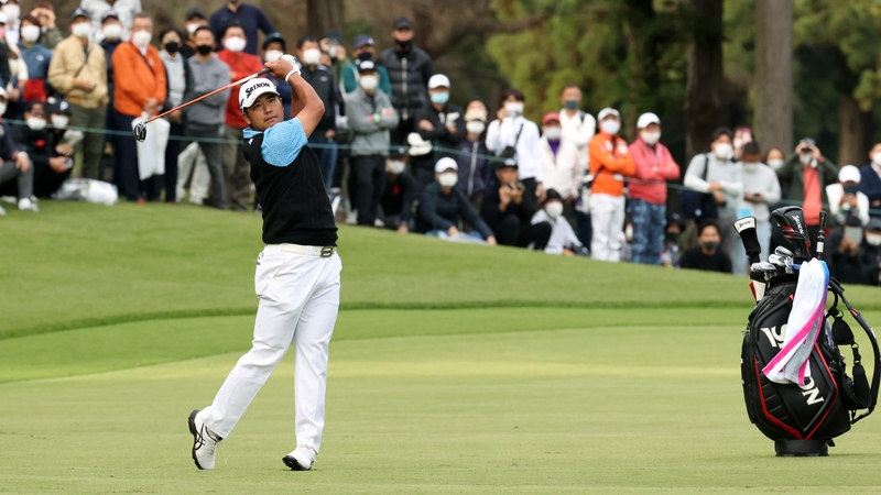 Hideki Matsuyama plays his second shot on 18