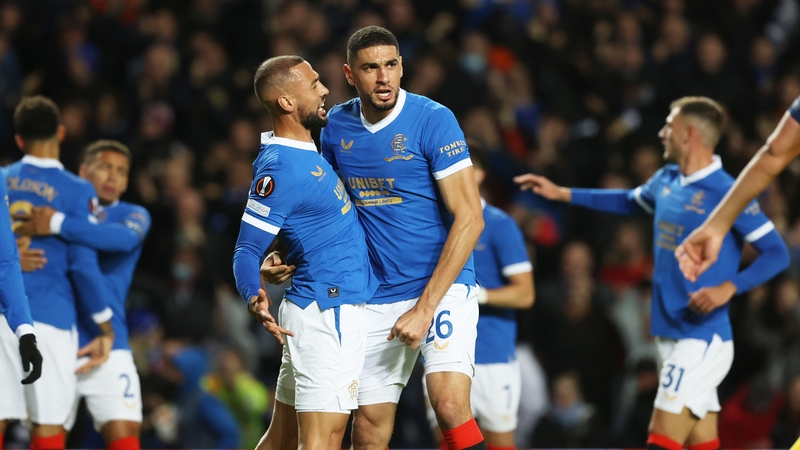 Leon Balogun celebrates his opener with Kemar Roofe (left)