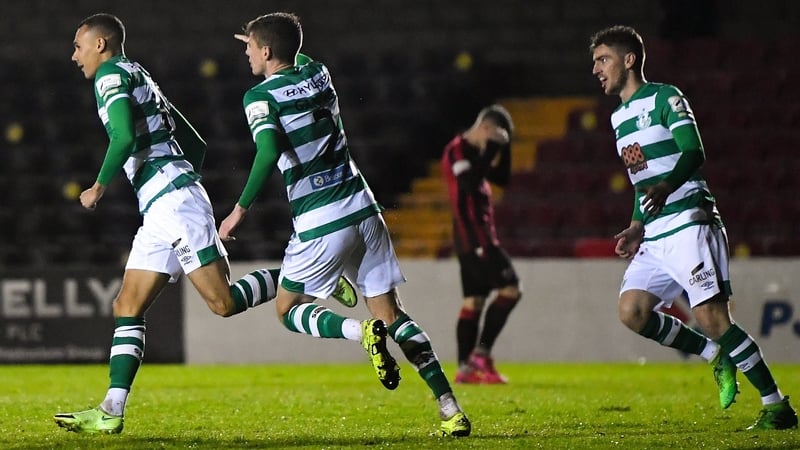 Graham Burke (L) celebrates after scoring the winner
