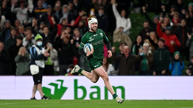 Mack Hansen sprints clear of the Ulster defence to score his second try of the game